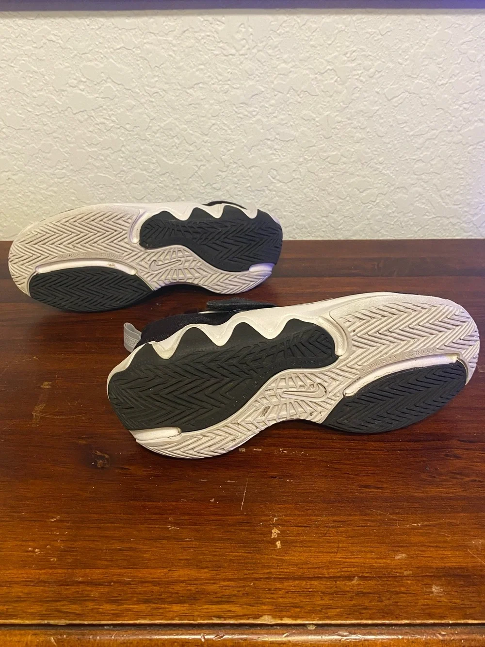 Nike Kids Black Sneakers with White Soles and Lime Accent